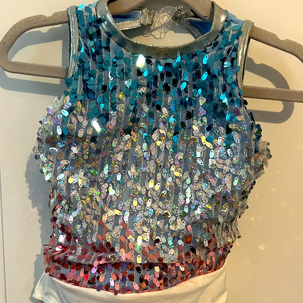 Costume gallery leotard with sequins. Comes with fringe shirt and tutu